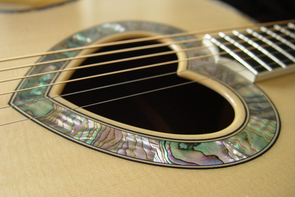 https://www.customguitarneckinlays.com/